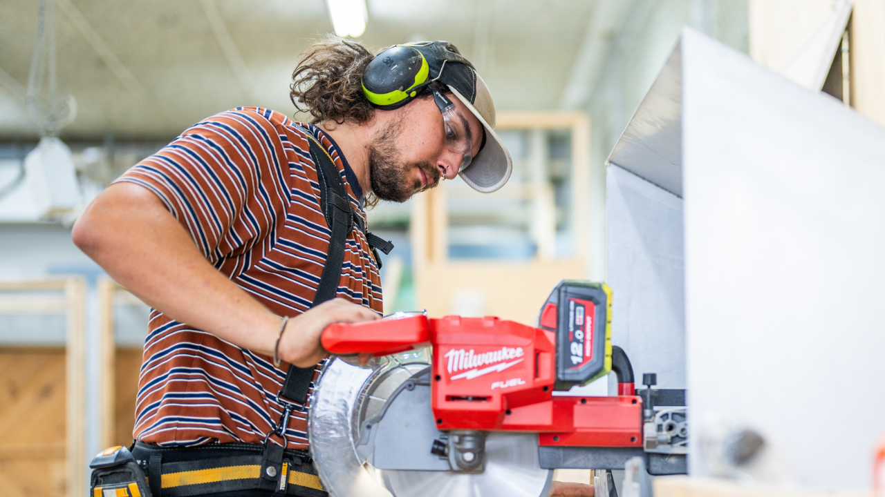 Tradesperson working with a circular saw