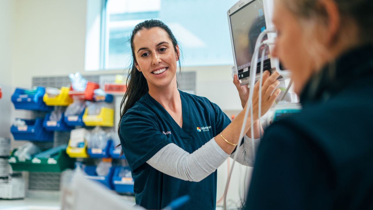 Female nurse in a hospital setting Female nurse in a hospital setting